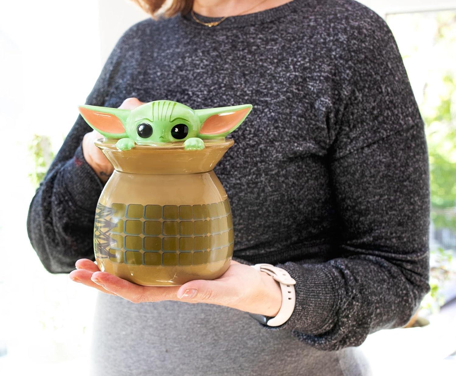 imageSilver Buffalo Star Wars The Mandalorian The Child Grogu Baby Yoda Hiding and Peeking Sculpted 3D Hand Painted Ceramic Snack Jar Small