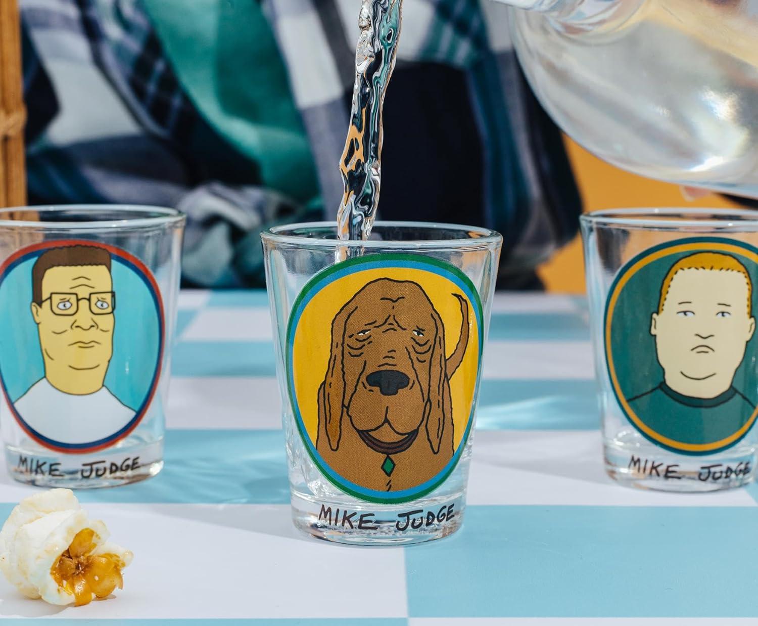 imageSilver Buffalo King of the Hill Character Faces 4 Pack Mini Glass Set Featuring Hank Hill Bobby Hill Peggy Hill and Lady Bird 15 Ounces