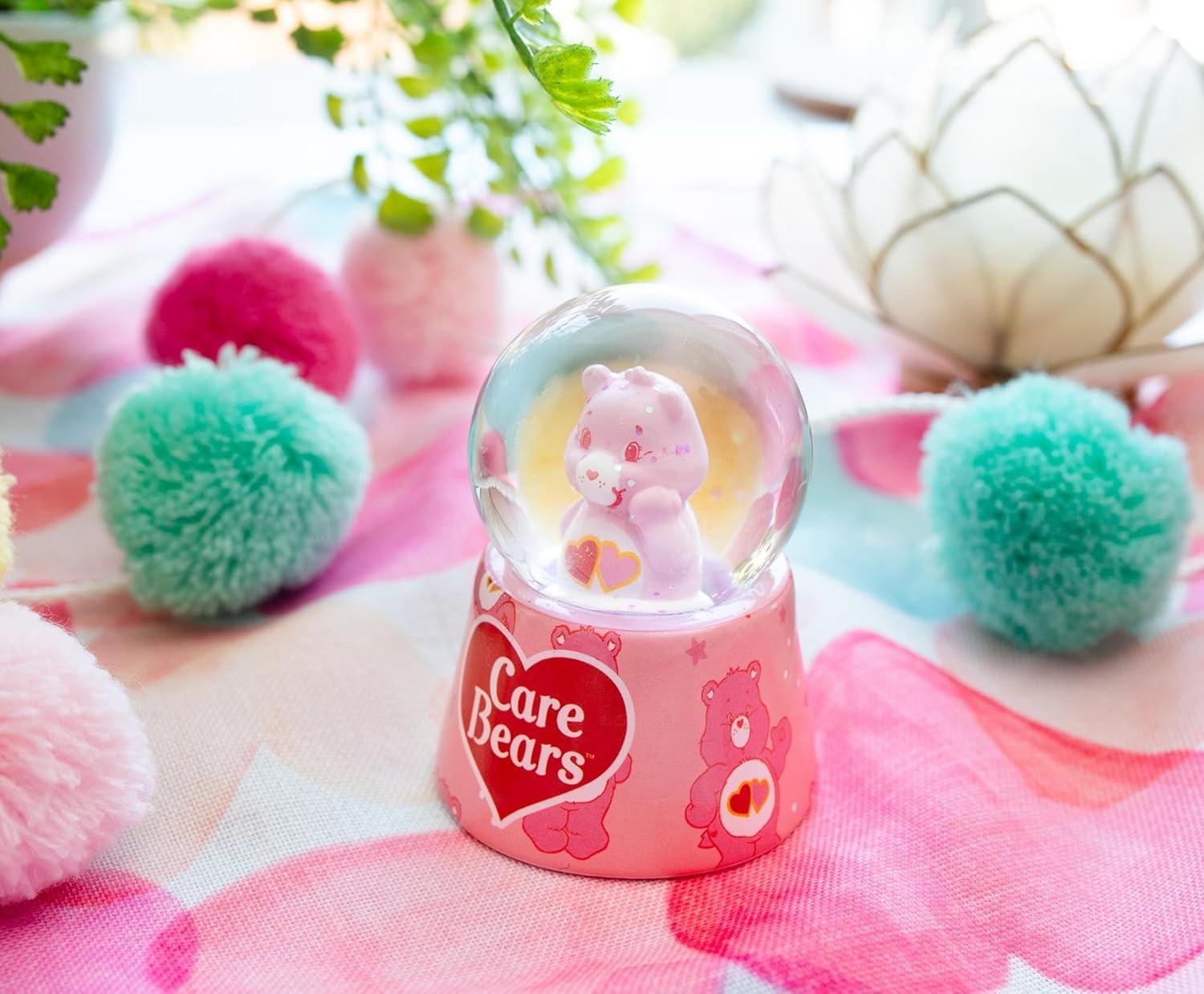 image:imageSilver Buffalo Disney Mickey and Friends Mini Light Up Snow GlobeDaisy Duck38 Inches Tall 45mm SmallCare Bears Lovealot Bear