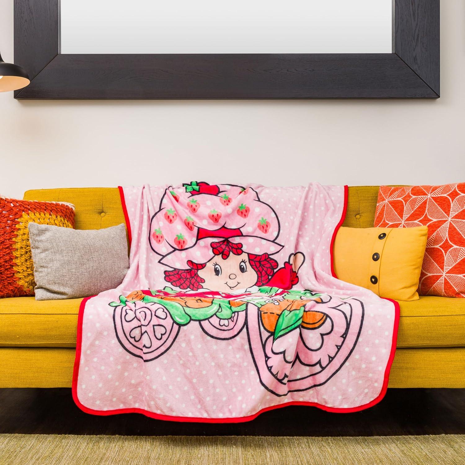 image:imageSilver Buffalo Peanuts Snoopy amp Woodstock 45 x 60 Inch Fleece Throw BlanketStrawberry Shortcake on Bike