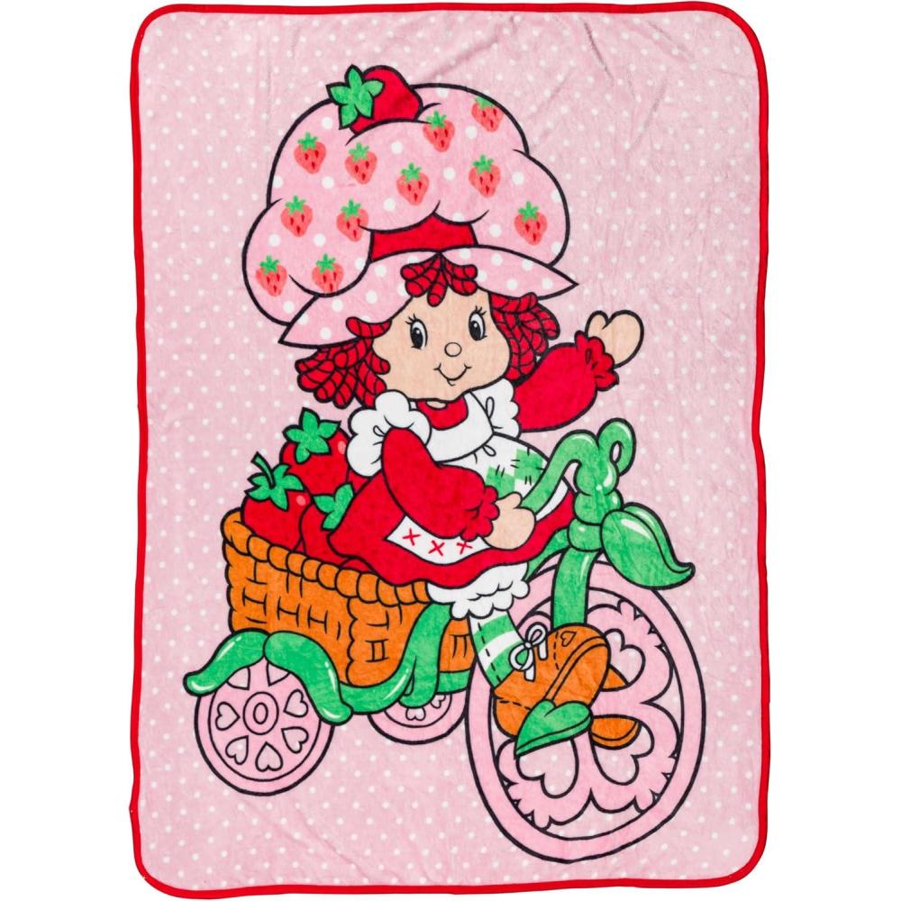 image:imageSilver Buffalo Peanuts Snoopy amp Woodstock 45 x 60 Inch Fleece Throw BlanketStrawberry Shortcake on Bike